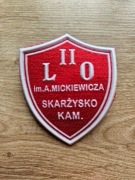 Tarcza szkolna II LO im. Adama Mickiewicza w Skarzysku-Kamiennej