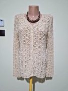 Sweter nietuzinkowy jakby szydełkowany/pleciony beżowy