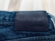 Spodnie marki Tommy Hilfiger, rozmiar na metce 34x34