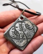 Trawiony amulet słowiański
