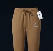 Polarowe spodnie dresowe M.Sara z haftowanym białym napisem love, L