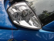 Reflektor prawy Mitsubishi Eclipce III