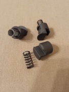 Beryl. Zatrzask i sprężyna kostki kolby.