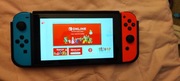 Nintendo Switch console + Mariokart racing wheel + Mariokart Deluxe 8 game 