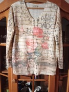 Elegancki damski sweterek.