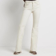 Kremowe dżinsy damskie River Island r. 42 FLARE MID RISE