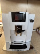 Ekspres ciśnieniowy JURA E6 na gwarancji z pojemnikiem szklanym na mleko