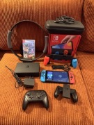 Nintendo Switch OLED + Grip + 128GB SD + Pad + Ring Fit Adventure