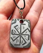 Trawiony amulet słowiański