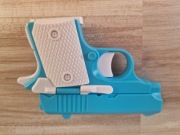 PISTOLET ZABAWKA ANTYSTRESOWA FIDGET TOY PISTOLECIK STRZELAJĄCY