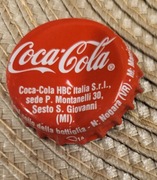 Kapsel Coca Cola butelkowane
