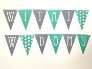 Girlanda, baner z napisem "Witamy w domu"