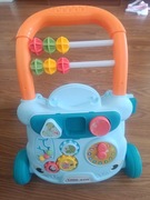 CHODZIK PCHACZ JEŹDZIK INTERAKTYWNY MUZYCZNY PIŁECZKI DLA DZIECI LEW 3W1