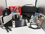 Nintendo Switch OLED White + Mobapad M6-HD + 2 gry+2 etui OKAZJA! GWARANCJA