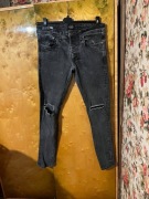 Spodnie męskie czarne z dziurami na kolanach Jack&Jones