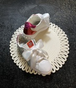 Bugatti skórzane sneakersy z kokardą roz.39 (24,5 cm)