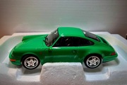 1:18 Porsche 911 (964) Carrera 4 Coupe 1990 Signal Green [NOREV]