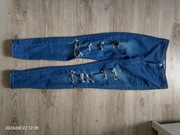 Spodnie damskie z przetarciami