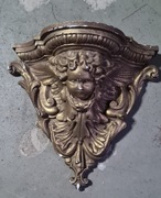 Gipsowa konsola ścienna – barokowy cherubin z ornamentem liści