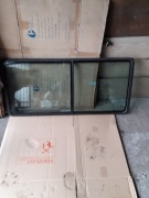 Szyba przesuwna T4  vw Multivan . Lewa. 