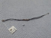 W Kruk Bransoletka srebrna na czarnym sznurku (nowa)