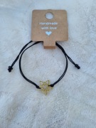 Ręcznie robiona bransoletka na sznurku z kwiatkiem