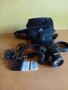 Aparat Nikon Coolpix P100  Zestaw: Torba, 2x Bateria, Ładowarka