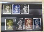 Angielskie znaczki funtowe.