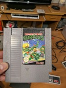 gra Nintendo NES: TEENAGE MUTANT HERO TURTLES  + plastikowy protektor