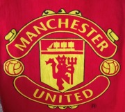 Vintage licencjonowany ręcznik klubu piłki nożnej Manchester United.     AB