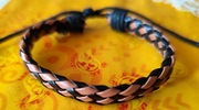 Pleciona bransoletka ze sztucznej skóry 