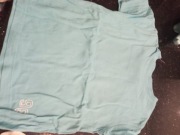 Błękitna koszulk next roz. 98