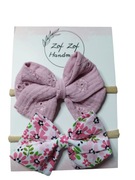 Kokardy na opasce bezuciskowej