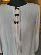 Beżowa bluzka mohito collection rozmiar 40 z czarnymi kokardkami