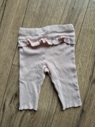 H&M legginsy pudrowy róż falbanka prążek dziewczęce 62