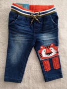 Nowe spodnie jeansowe jeansy na gumie tygrys tygrysek 74