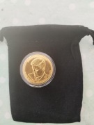 Dolar amerykański John F. Kennedy 26 mm, pozłacany24k, w plastikowym kapslu