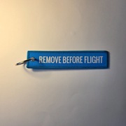 Haft REMOVE BEFORE FLIGHT brelok