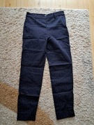 Spodnie H&M w paski granatowe dla kobiety.