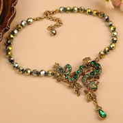 Naszyjniki wąż z zielonych cyrkonii