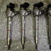 Wtryskiwacze używane Bosch 0 445 110 835 / VW 03L 130 277E 4 szt