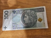 Banknot obiegowy 100zl seria DY2727504