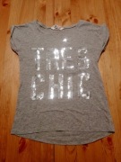 H&M T-shirt dziewczęcy szary z cekinami r 146 