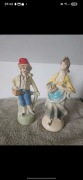 Figurka porcelanowa  chłopiec w czerwonej czapce i figurka kobiety