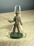 Żołnierzyk PRL. Kowboj z rewolwerem Stara figurka. 