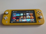 Nintendo Switch Lite żółty + akcesoria 