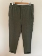 Oliwkowe spodnie smart casual Zara