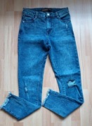 Nowe dżinsy z przetarciami Clockhouse 36