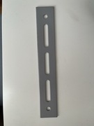 Łącznik , płaskownik montażowy z otworami.