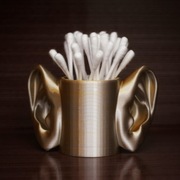 Surrealistyczny pojemnik na patyczki do uszu